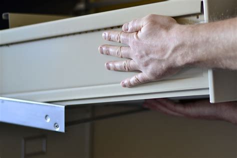 how to remove genuine steel wirks cabinet filing drawers|remove drawer from metal cabinet.